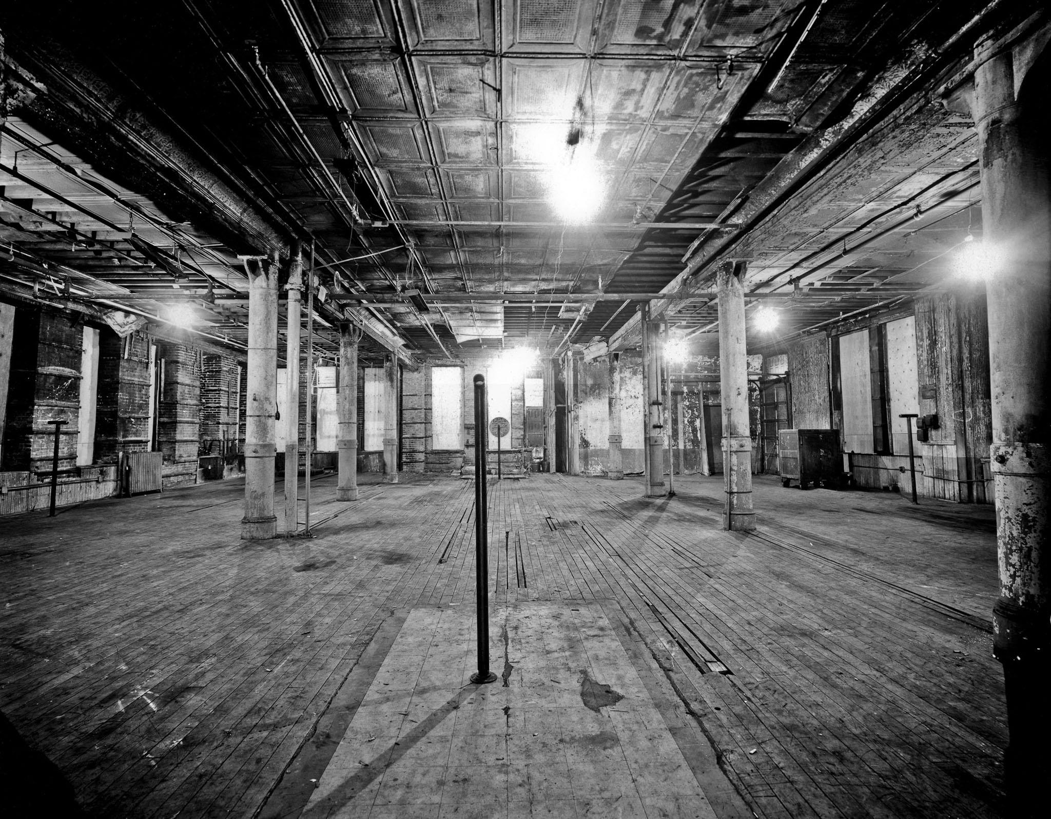 installation of a Locator sculpture in a raw space