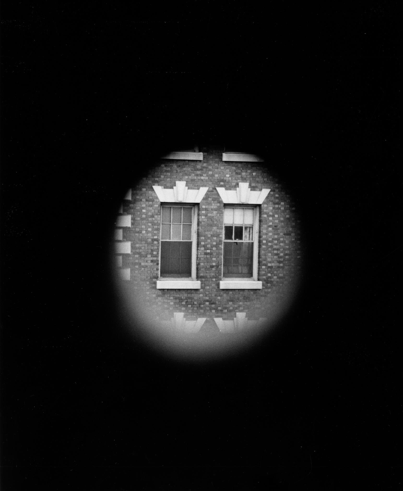 an image looking through a Locator at two windows