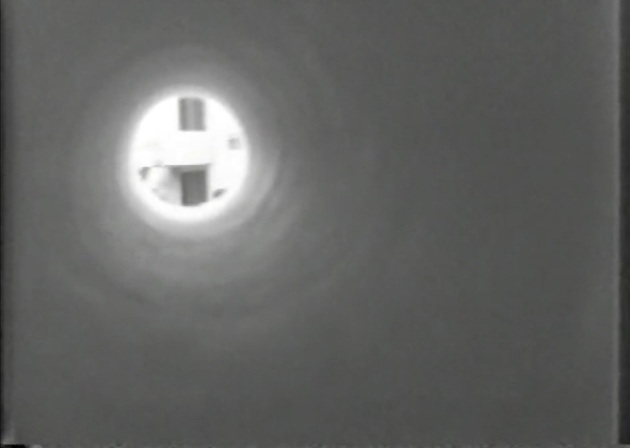 black and white video still