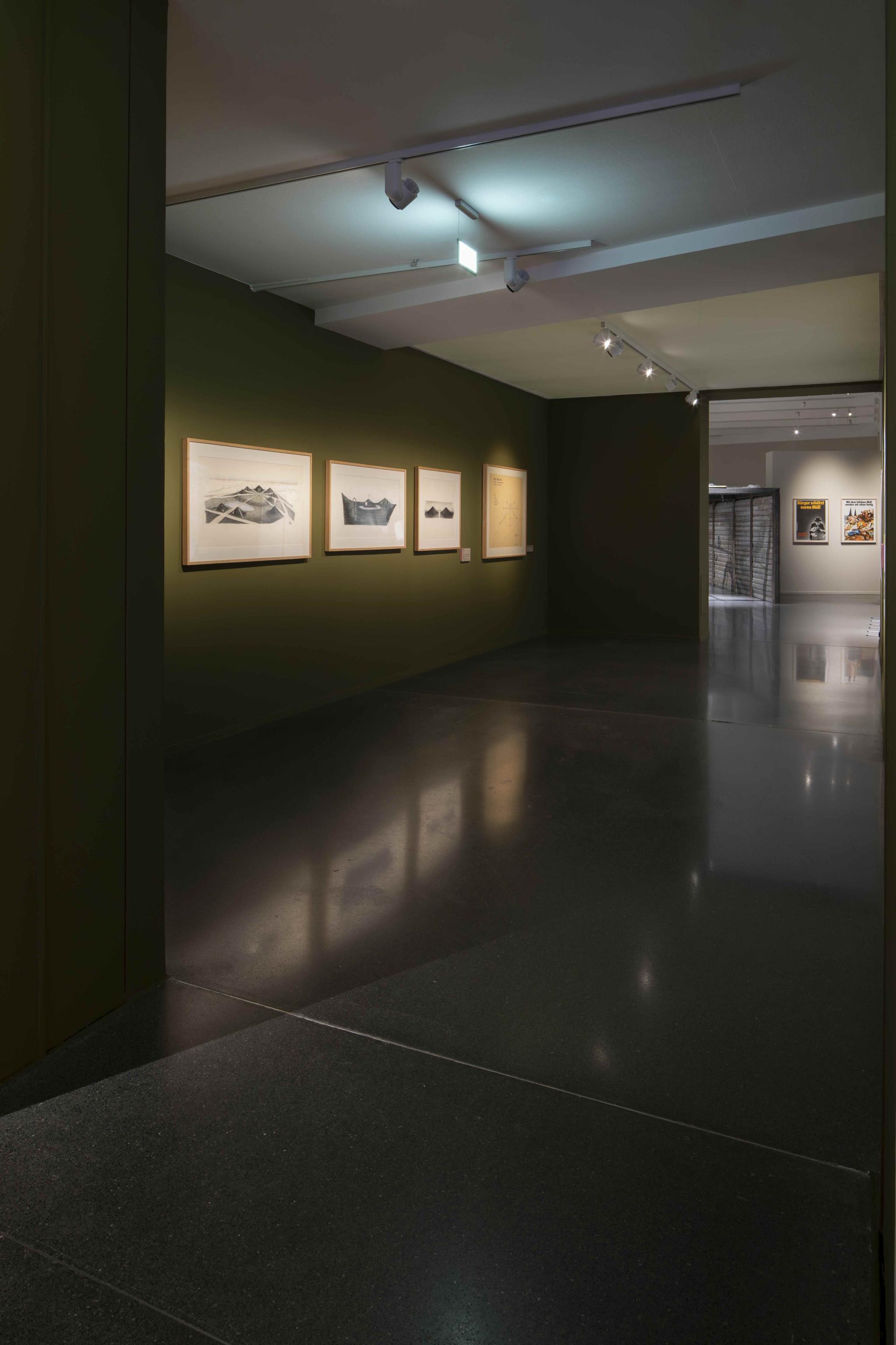 installation image of an exhibition showing Nancy Holt's Sky Mound project