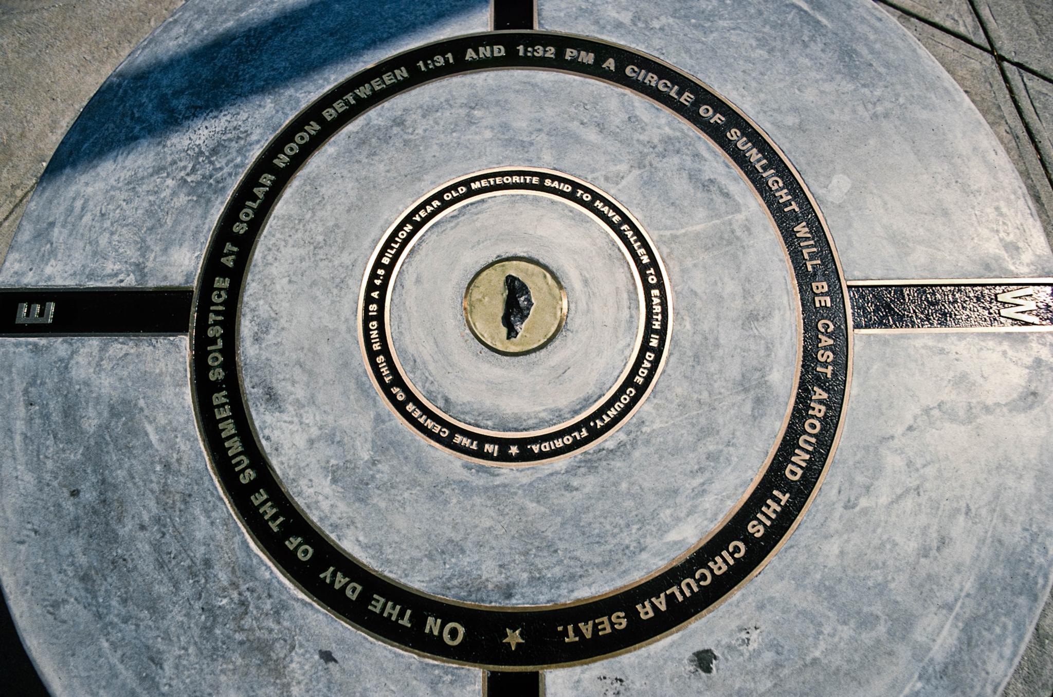 a sculpture on a university campus