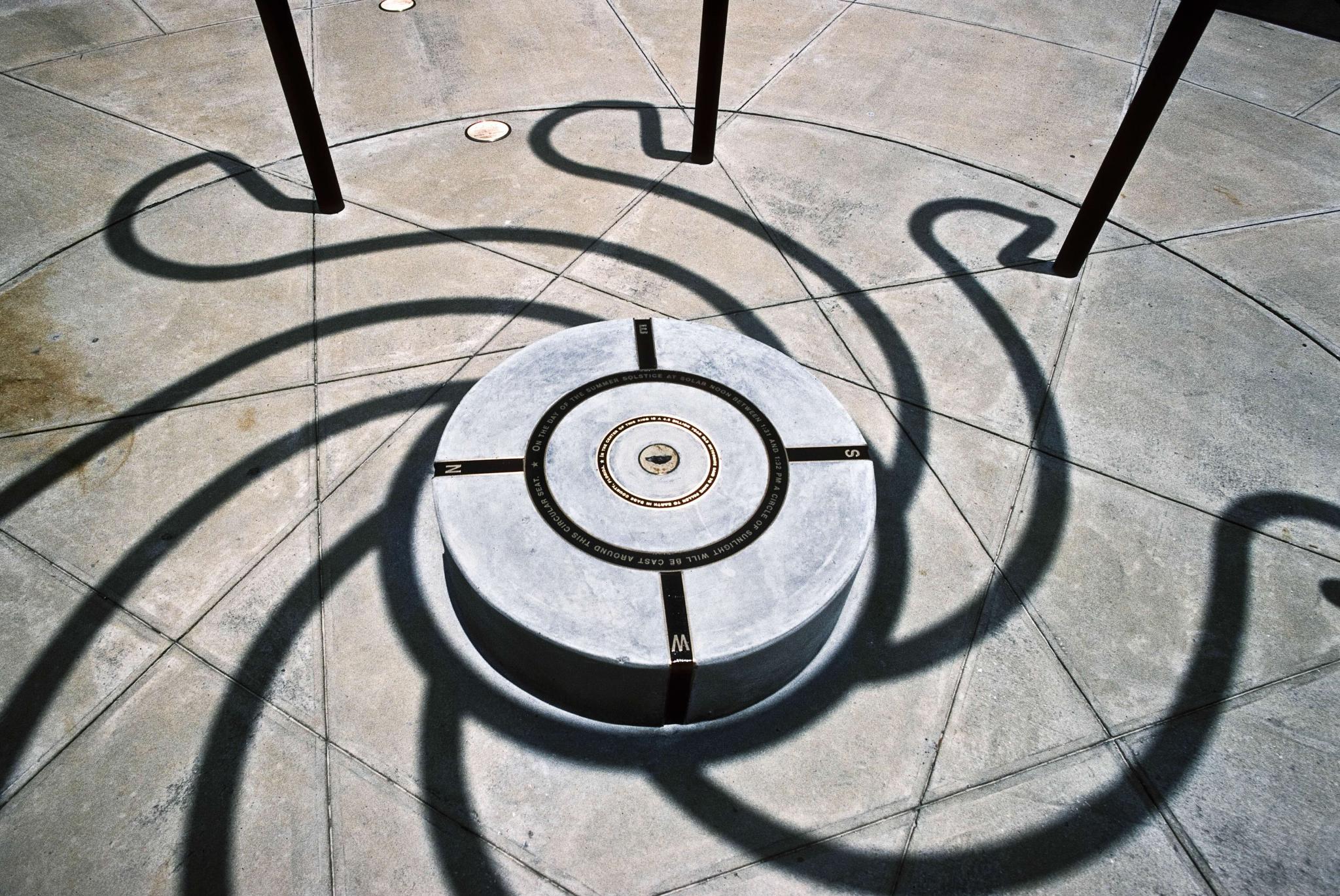 a sculpture on a university campus