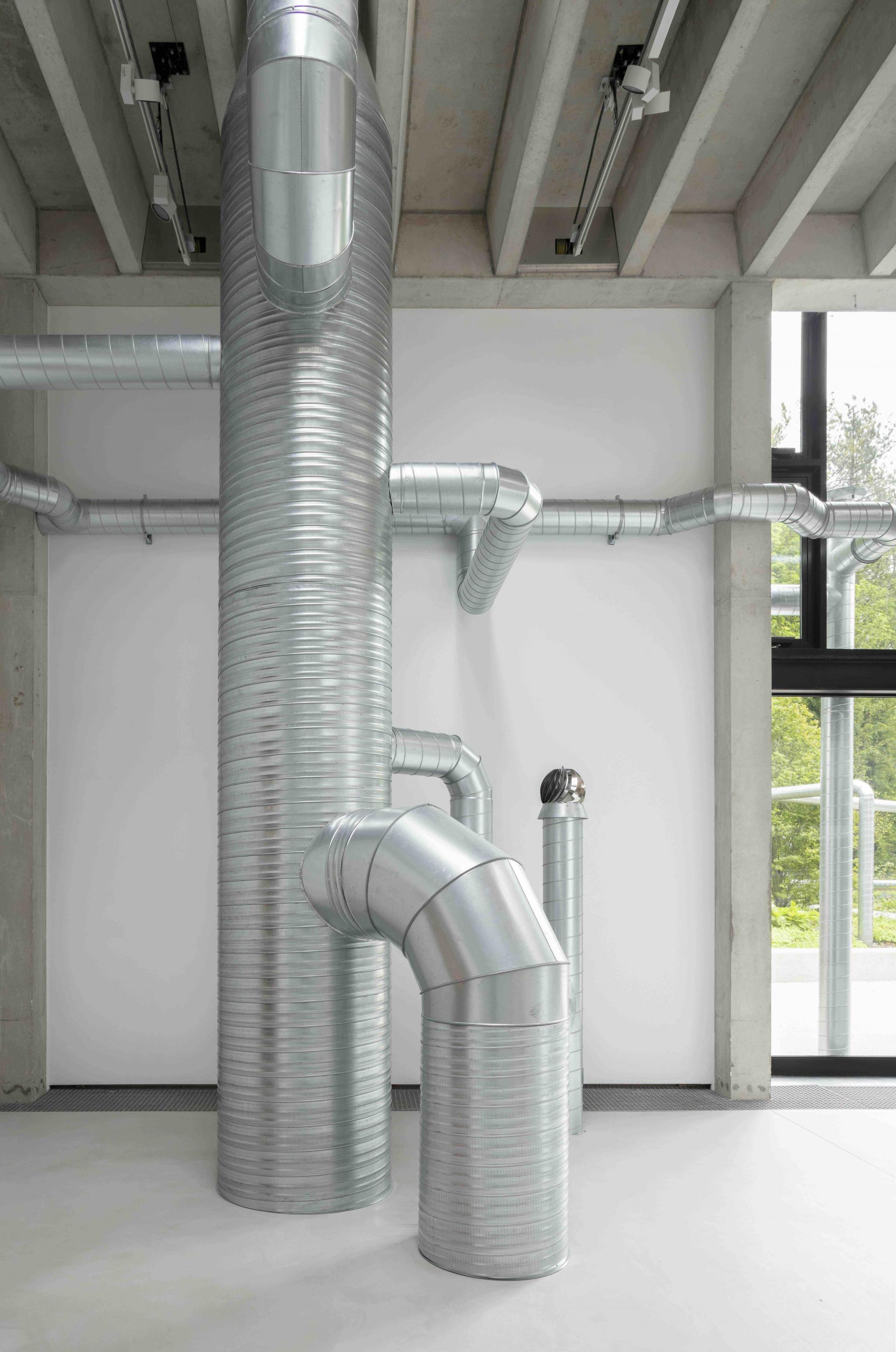 detail of a sculpture made of ventilation pipes