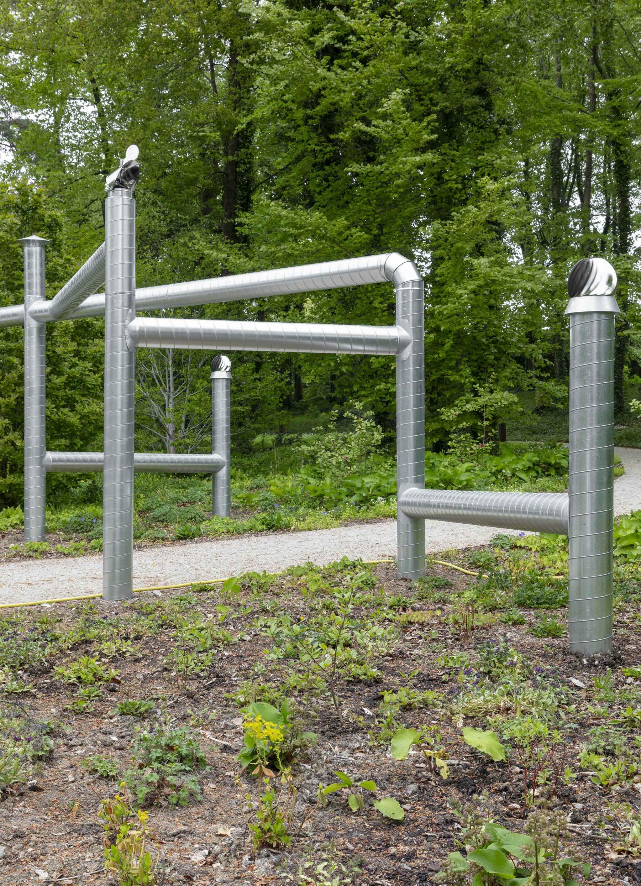 detail of an artwork made of ventilation pipes