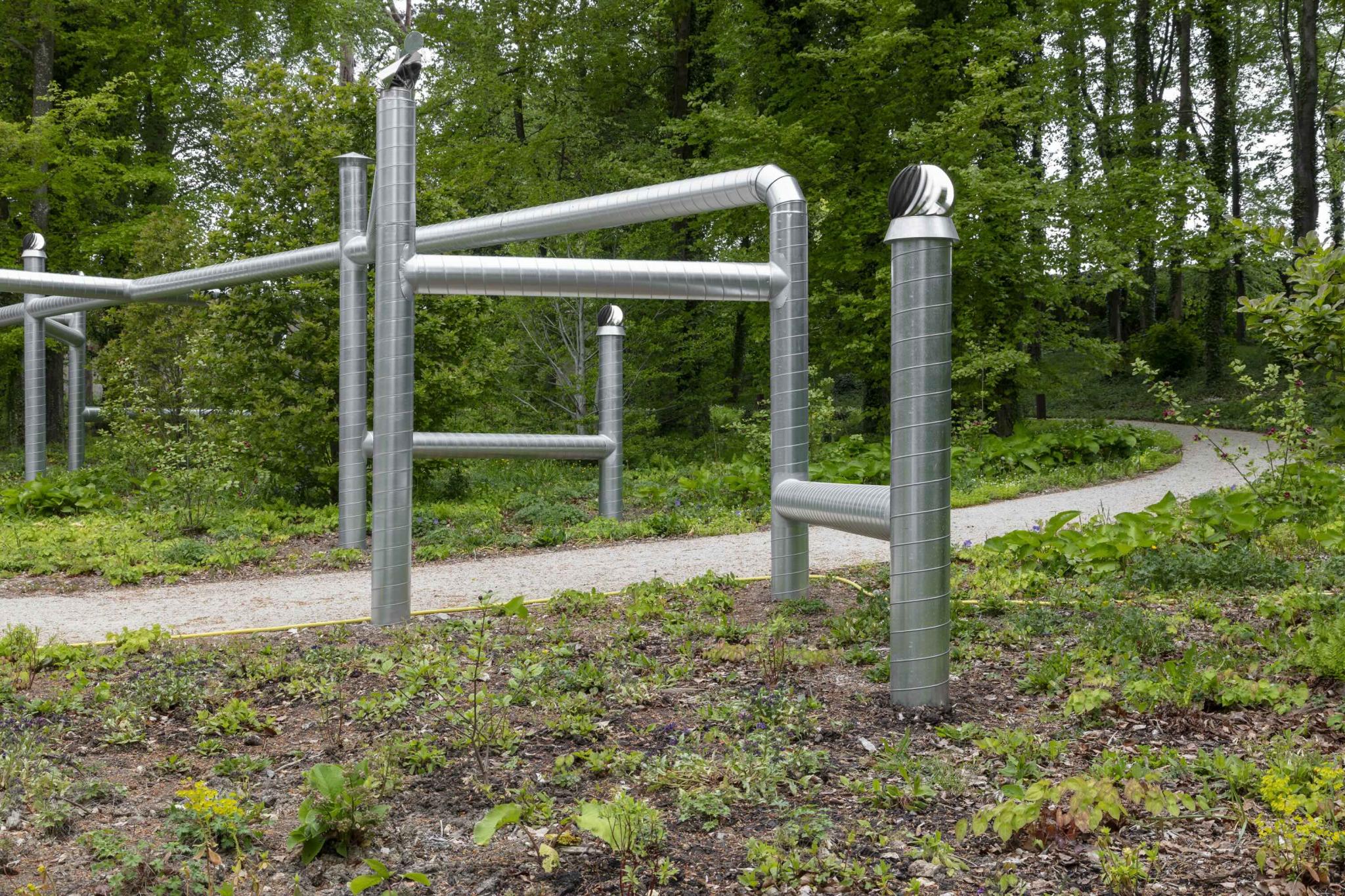 detail of a sculpture made from ventilation pipes