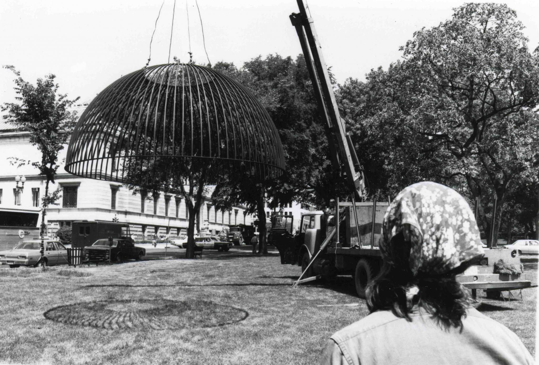 installing a sculpture in an urban park