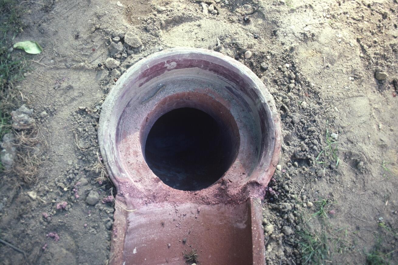 a sculpture made out of a drainage system